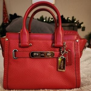Red small cross body Coach purse